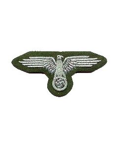 RSE39B.Waffen SS officers sleeve eagle.Silver bullion  and wire on Green.Each row of the wing is embroidered  seperately with fine aluminum wire.